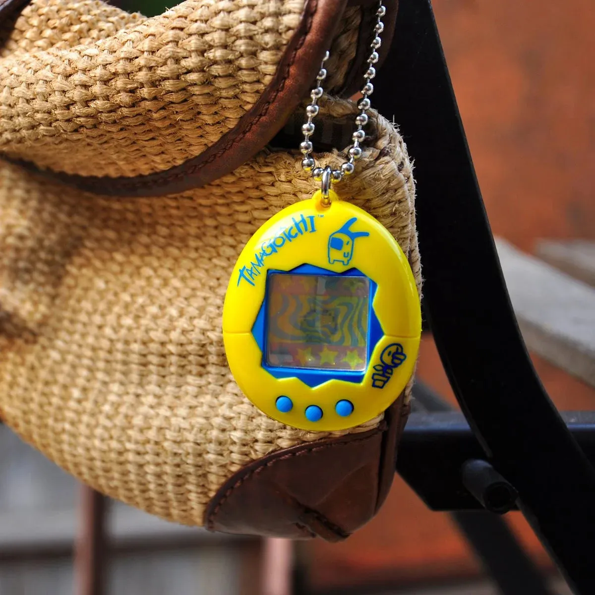 Bandai - The Original Tamagotchi (Gen 2) Yellow with Blue Portable Electronic Game (42812) LOW STOCK